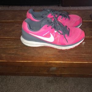 Neon pink nike shoes
